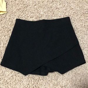 Black mini envelope skirt